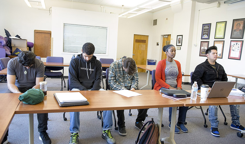 Students conduct a posture experiment.